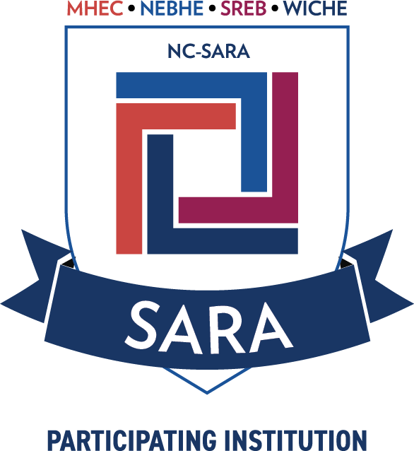 The NC-SARA "Participating Institution" logo, featuring a shield with a red, maroon, and blue geometric emblem, with the text "SARA" on a blue ribbon and "PARTICIPATING INSTITUTION" below.