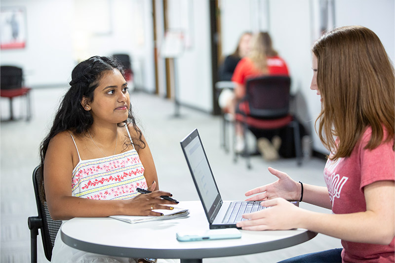 Students in a peer counseling meeting