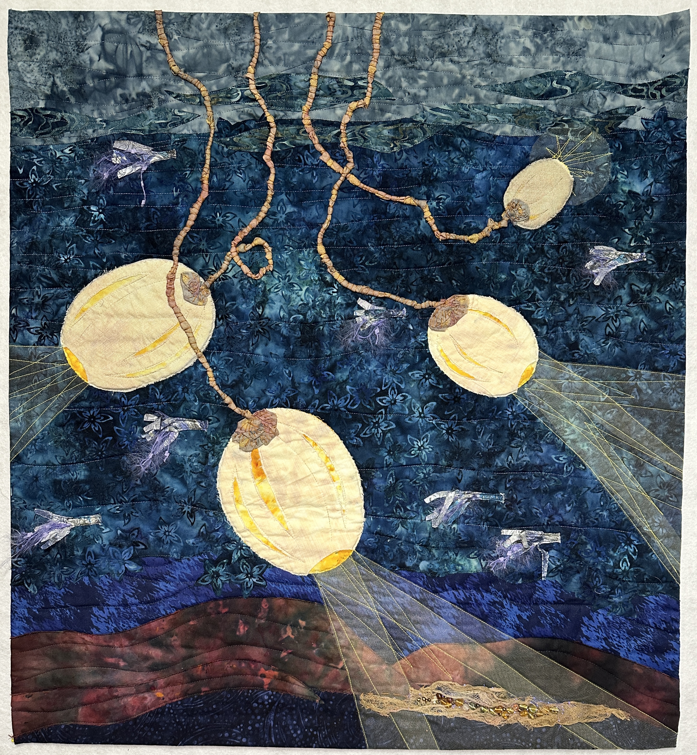 Quilt design, featuring deep blue and yellow.