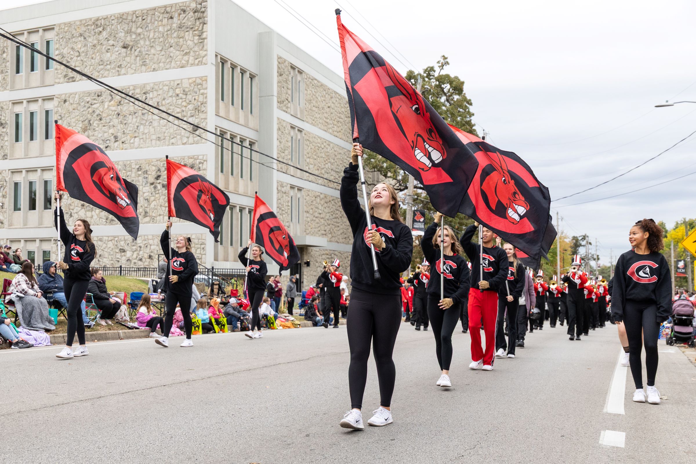 Marching Mules walk in 2025 Homecoming parade