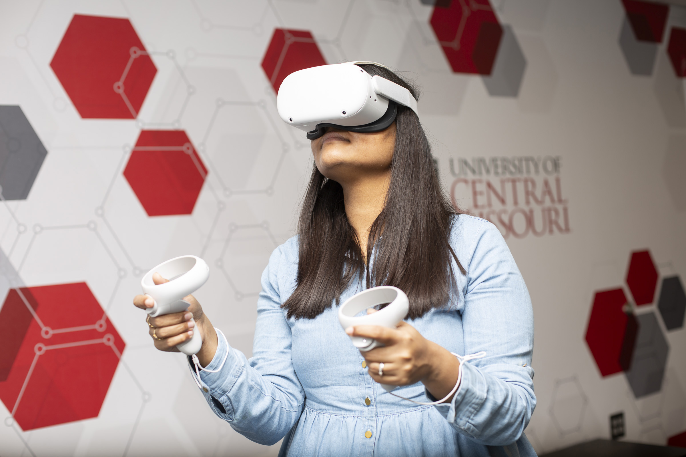 Student using extended reality tech.