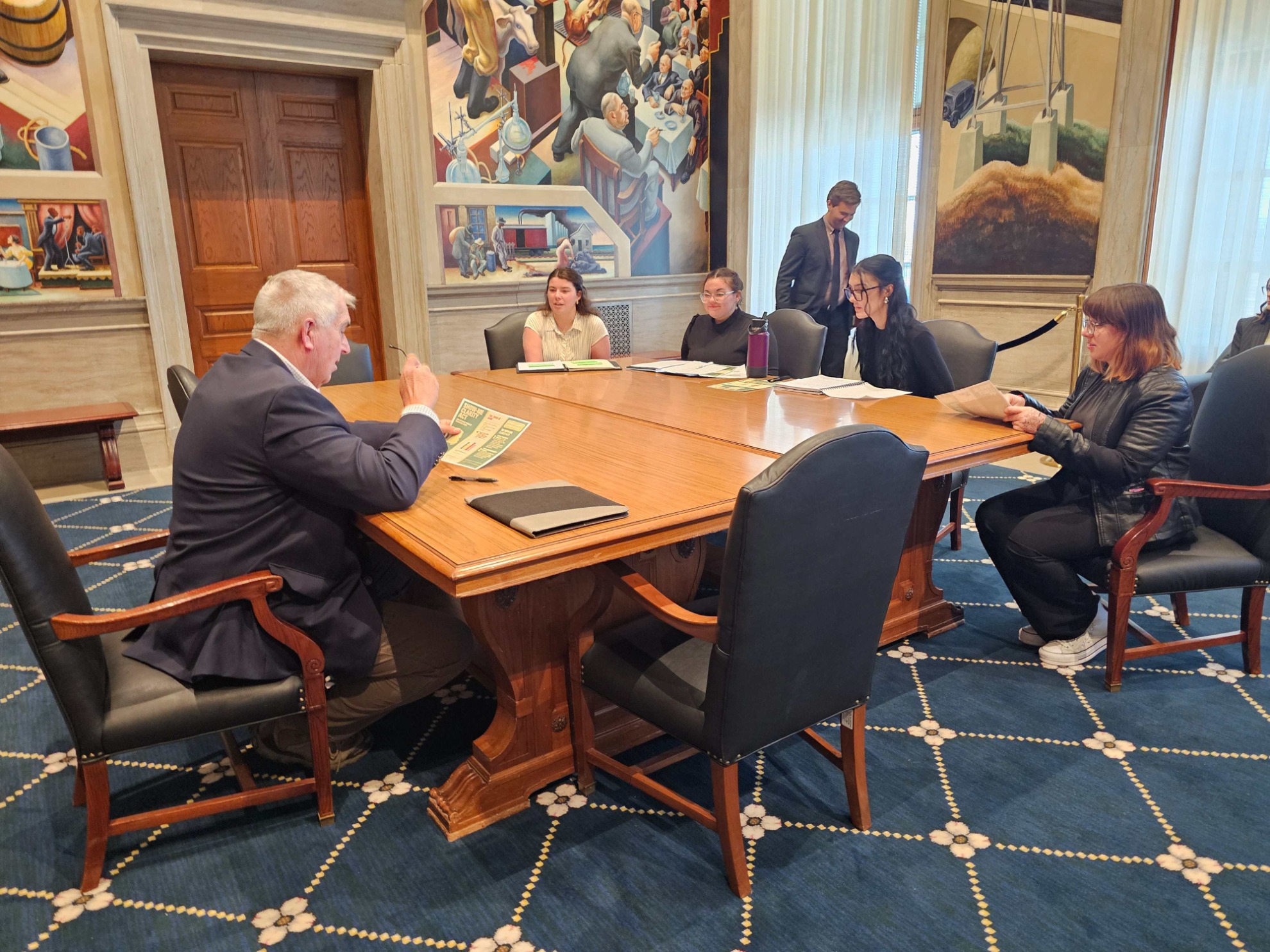 Honors College student presenting policy proposal to Missouri State Representative.